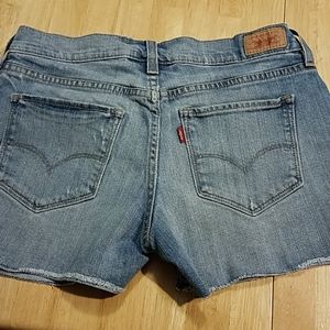 Levi's cut off raw edge light wash denim jean shorts Size 0
